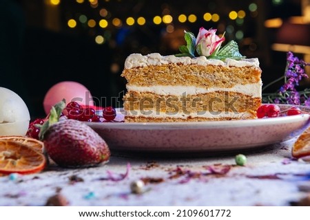 Piece of sweet carrot cake with delicious cream