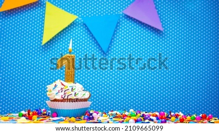Postcard with the number 1 for any holiday or anniversary. Happy birthday cupcake cream with number one copy space. happy birthday background decoration Royalty-Free Stock Photo #2109665099