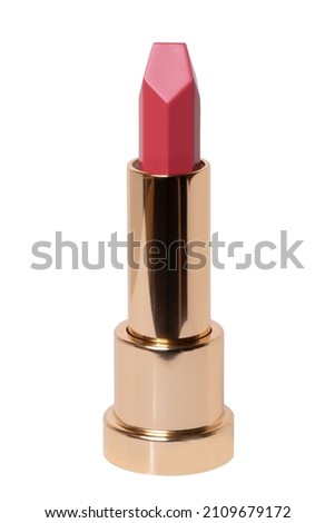 Lipstick isolated. Closeup of a elegant gold lipstick isolated on a white background. Make-up and beauty concept. Macro.