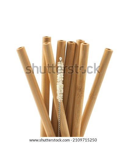 Bamboo straws isoalted on white background. Drinking straws from bamboo wood for reusing and reducing the use of plastic straw. Royalty-Free Stock Photo #2109715250