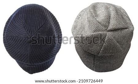 two dark blue and gray hats isolated on white background .knitted hat .