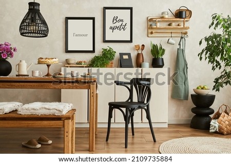 Stylish composition of cozy kitchen interior design with mock up poster frames, beige commode, wooden table, chair and bench and kitchen accessories. Template.
