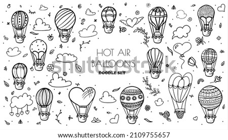Doodle vector set of hot air balloons with clouds. Colorful hand draw illustration flying vehicles. Romantic balloons. Sky with tourist balloons for flight. Cartoon style