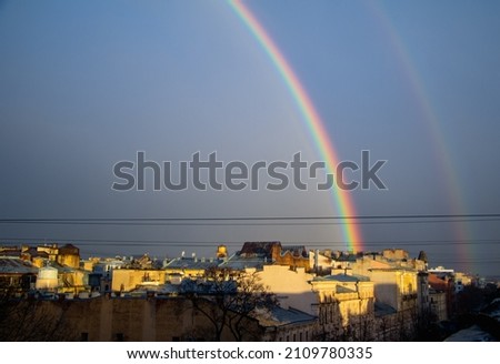 rainbow in the sky over the city. High quality photo