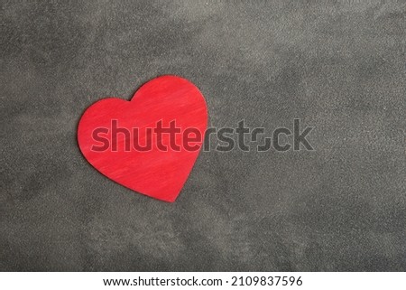 Valentine's Day greetings concept. Red heart shaped card with empty space for your text. Valentines greeting card.
