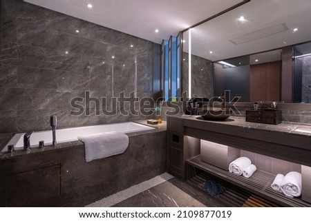 Interior of a modern bathroom with Marble material.