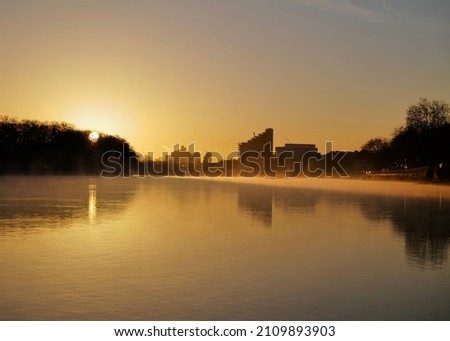 River `Thames sunrise, Putney, London, UK