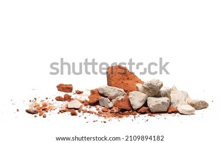 Pile shattered red bricks pieces and stone isolated on white   Royalty-Free Stock Photo #2109894182