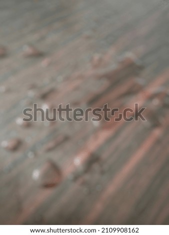Defocused Abstract Background Water Splash on the Wooden Table