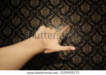 selective focus abstract background hand and finger with flash camera