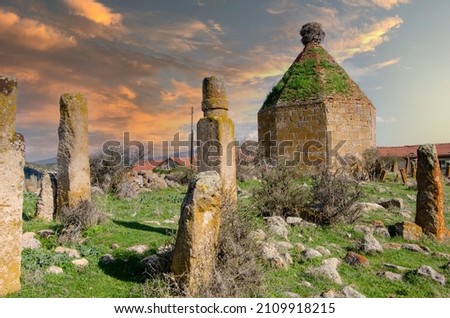 Historical ancient Frig (Phrygia, Gordion) Valley. Tomb (shrine, turbe) and old cemetery. Frig Valley is popular tourist attraction in the Yazilikaya, Afyon - Turkey. Royalty-Free Stock Photo #2109918215
