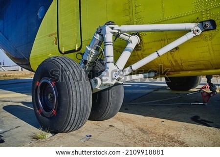Helicopter landing gear with aircraft thrust pad. Landing gear of military helicopter. Wheel Of Airplane Or Helicopter.
