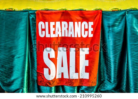Market Sign Pointing the Way to Clearance sale