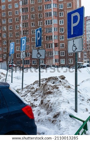 road sign in the residential sector parking only for the disabled.(Corrected)