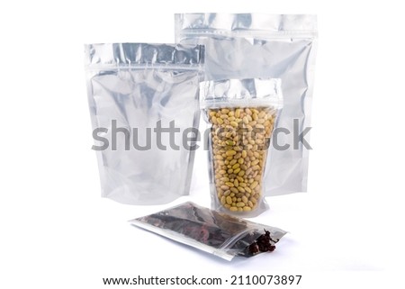 Smell Proof Resealable Aluminum Foil Zip Lock Plastic Bags for Long Loop Food Storage. Royalty-Free Stock Photo #2110073897