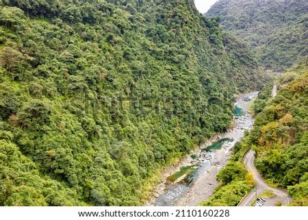 Aerial shot of a stream in a valley