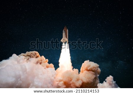New Space Shuttle rocket with puffs of smoke and blastoff successfully launched into space. Spaceship lift off. Start up, concept  
