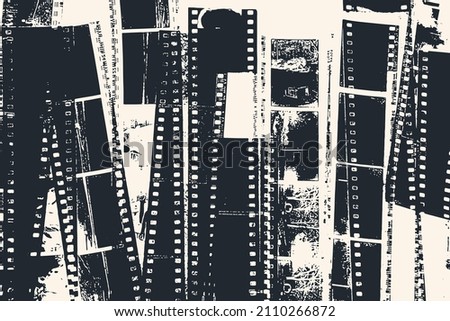 Abstract background with cut strips of photographic negatives film. Vector illustration Royalty-Free Stock Photo #2110266872
