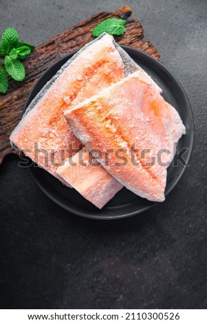 char fish frozen raw seafood freezy cooking red fish pieces long-term storage healthy meal food snack on the table copy space food background rustic top view pescatarian diet Royalty-Free Stock Photo #2110300526
