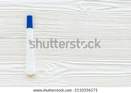 Pregnancy test top view. Pregnancy and female health care concept