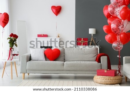 Interior of living room decorated for Valentine's Day Royalty-Free Stock Photo #2110338086
