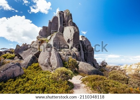 View of Cathedral Rock formation near The Hump at Mt Buffalo on a summer's afternoon in the Victorian Alps, Australia Royalty-Free Stock Photo #2110348118