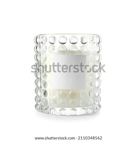 Beautiful wax candle on white background