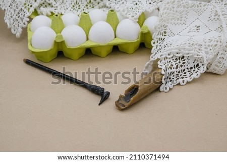 Easter preparation of tools for painting eggs. Homemade pen and beeswax for drawing. Pysanka handmade. Ukraine. Copy space.