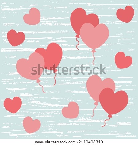 Pink hearts on a blue textured background. Greeting card