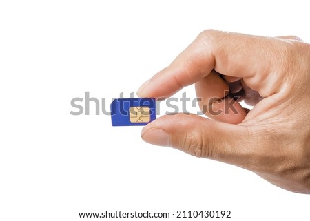 the right hand of a man from Indonesia holds a blue standard type sim card on a white background