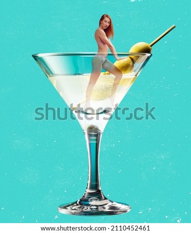 Sweet and sour. Young slim girl into martini cocktail glass isolated on blue background. Surrealism. Copy space for ad, text. Modern design. Conceptual, contemporary art collage. Party time, fun mood.