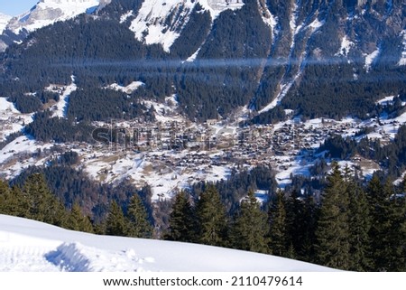 Aerial view of mountain village Wengen at the Bernese Highlands on a sunny winter day. Photo taken January 15th, 2022, Lauterbrunnen, Switzerland.