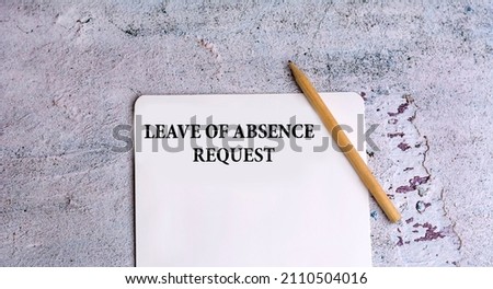 Leave of absence request and wooden pencil  Royalty-Free Stock Photo #2110504016