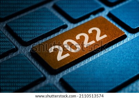 2022 keyword written on laptop keyboard macro photography, closeup view of 2022 keyword