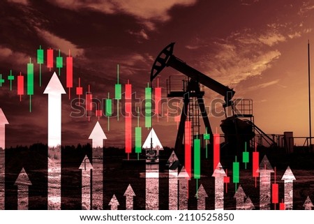 Falling oil prices. The arrow on the chart goes down. Crisis crude oil market. Reducing the cost of hydrocarbons. Oil pump, drilling rig in the background. Oil market forecast. energy crisis Royalty-Free Stock Photo #2110525850