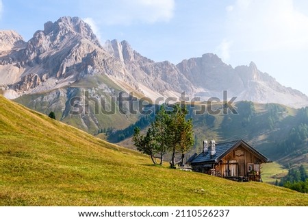 Alpine landscape walking from Passo San Pellegrino to Fuciade refuge. Italian Dolomite Alps, Trentino Royalty-Free Stock Photo #2110526237