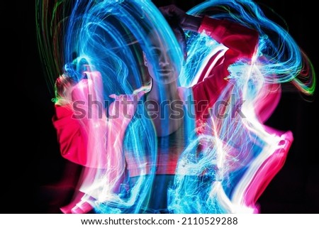Metaverse digital Avatar, Metaverse Presence, digital technology, cyber world, virtual reality, futuristic lifestyle. Woman in augmented reality, NFT game with neon blur lines Royalty-Free Stock Photo #2110529288