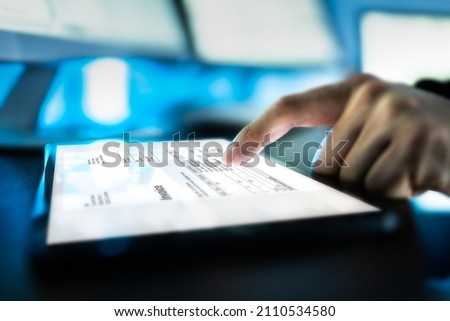 Digital Tax E Invoice Online Software On Tablet Screen Royalty-Free Stock Photo #2110534580