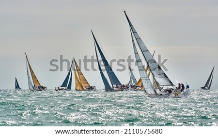 Yachting race in the sea under sail. Sailing yachts regatta Royalty-Free Stock Photo #2110575680