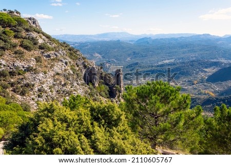 The aguja needle seen from the Mirador or viewpoint of Puerto de las Palomas in the Sierra de Grazalema Natural Park in the rural Spanish country side near Grazalema, Spain.