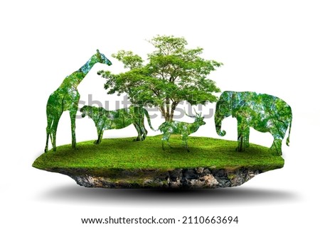 World Wildlife Day forest silhouette in the shape of a wild animal wildlife and forest conservation concept Royalty-Free Stock Photo #2110663694