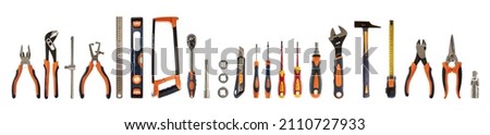 Work tools isolated on white background. Hand tool new set with rubber black and orange handle for repair and construction, banner Royalty-Free Stock Photo #2110727933
