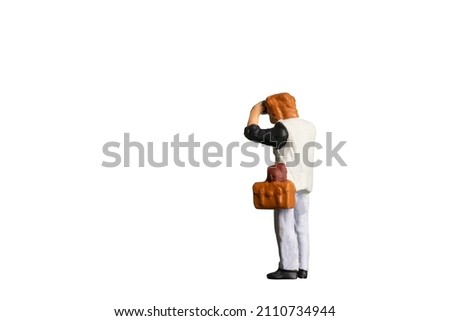 Miniature people Photographer isolated on white background with clipping path