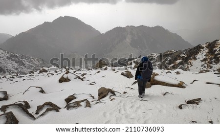 Snow Fall at Laka, Triund Hill, Indrahar Pass Trail, Dauladhar Range, Himachal Pradesh, India Royalty-Free Stock Photo #2110736093