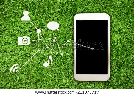 smartphone on grass background