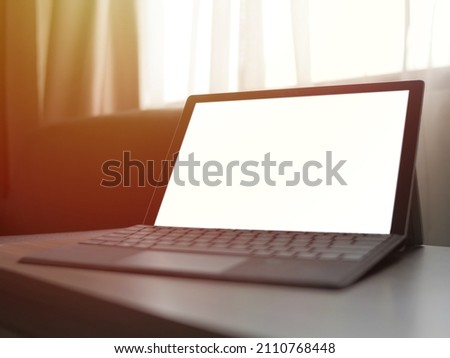 Close up image of  laptop mock up, pc computer monitor with blank empty white screen template, laptop on desk
