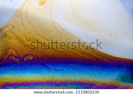 Colorful patterns on soap bubbles moving beautifully for light art background