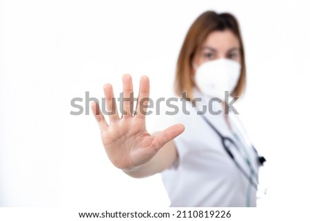 Doctor, nurse and pharmacist gesturing to stop.