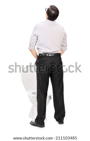 Rear view studio shot of a man taking a piss isolated on white background Royalty-Free Stock Photo #211103485