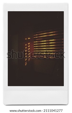 Polaroid photo dark light shadow Royalty-Free Stock Photo #2111041277